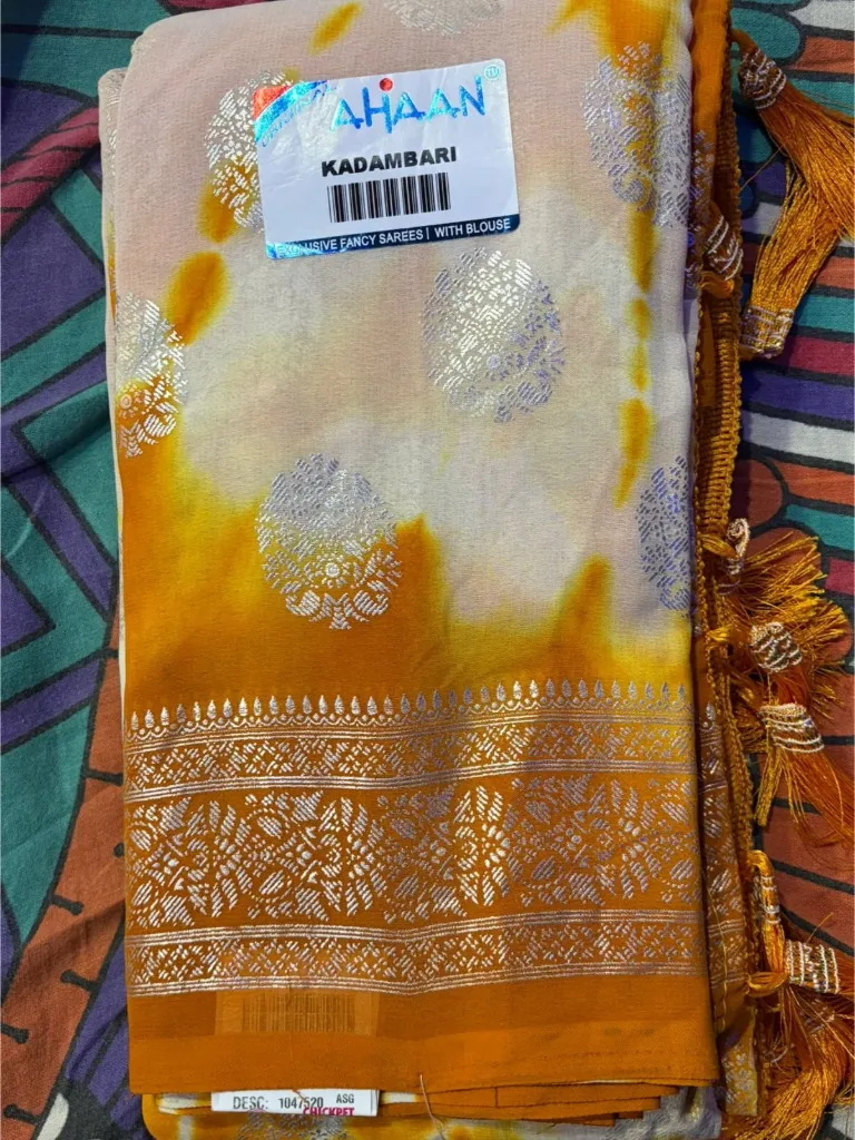 semi-silk saree with zari weaving and tie-dye pattern